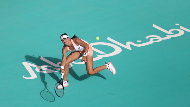 Ajla Tomljanovic of Australia plays a forehand against Aryna Sabalenka of Belarus during her Women's Singles match on Day Three of the Abu Dhabi WTA Women's Tennis Open at Zayed Sports City on January 08, 2021 in Abu Dhabi.