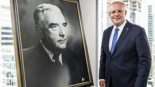 Prime Minister Scott Morrison with a portrait of Liberal Party pioneer Sir Robert Menzies.  