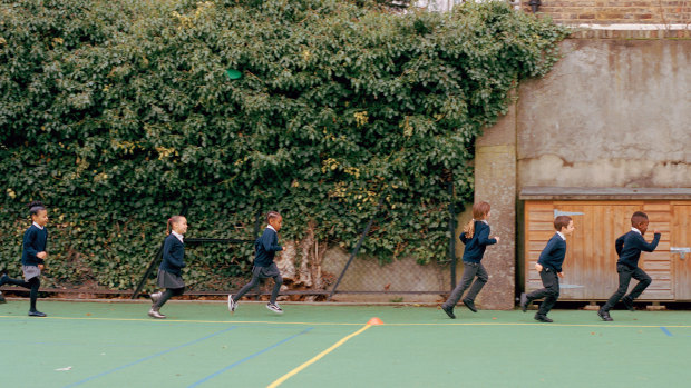 Children at a north London primary school during their 15-minute Daily Mile exercise.