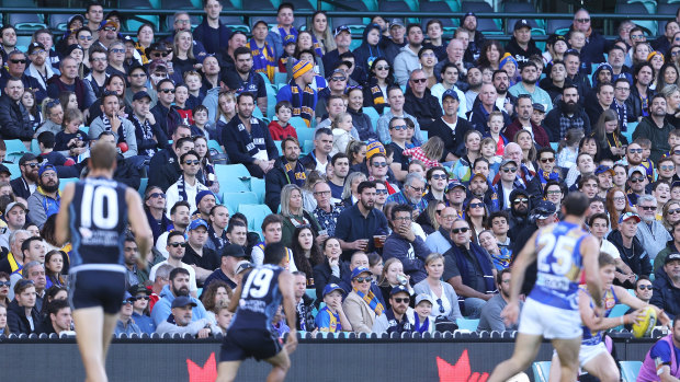 The crowd watches on during the round 12 AFL match between the Carlton Blues and the West Coast Eagles at Sydney Cricket Ground.