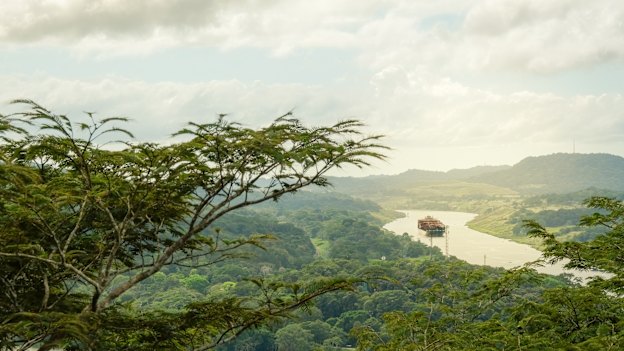 A cargo boat moves along the Panama Canal in 2018.