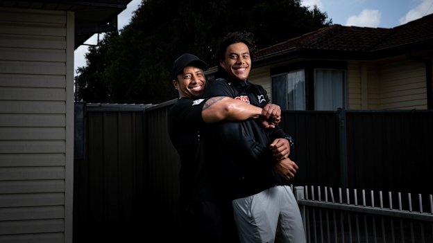 Martin Luai, who was released from prison in April, with his son Jarome at the front of their Dharruk home.