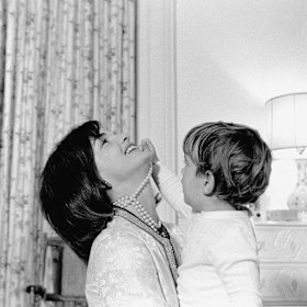 In the White House with son John jnr, one of those “in-between moments of a life”.