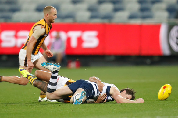 Patrick Dangerfield is tackled by Shaun Burgoyne during Friday night's match at GMHBA Stadium. 