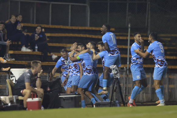 Tynan Diaz and his APIA Leichhardt teammates celebrate their second goal - a long-range screamer.