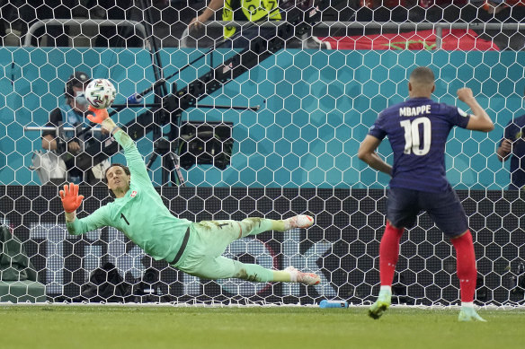 Yann Sommer saves Kylian Mbappe’s penalty attempt to put Switzerland into the last eight at Euro 2020.