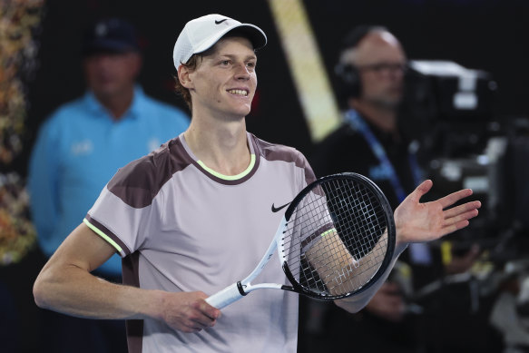 Jannik Sinner celebrates after defeating Andrey Rublev in their Australian Open quarter-final match.