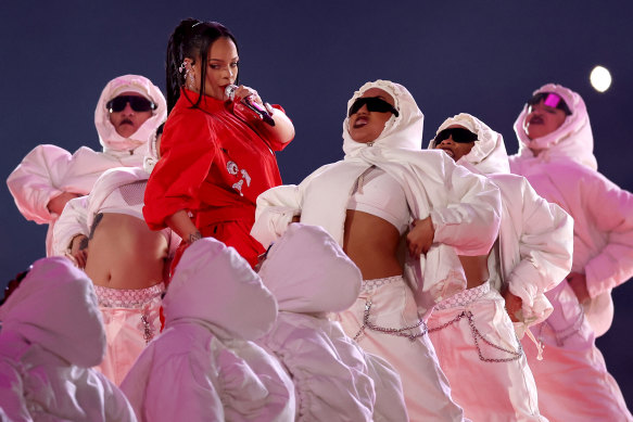 Rihanna and her merry band of Michelin Men.