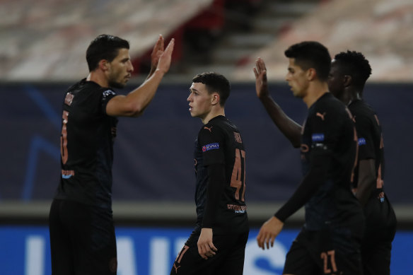 Manchester City's Phil Foden, centre, after scoring the only goal of the game against Olympiakos.