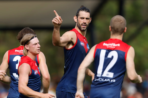 Brodie Grundy celebrates a goal durng the Demons’ practice match against Richmond. 