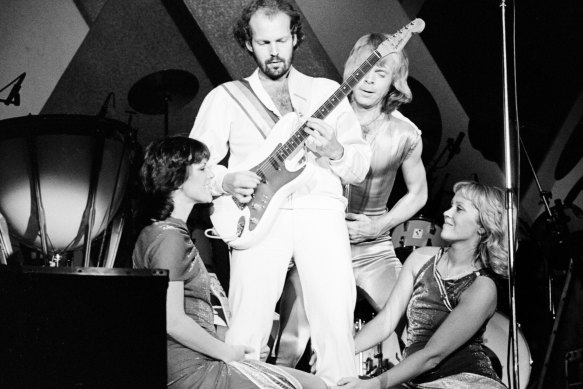 ABBA guitarist Lasse Wellander with Anni-Frid Lyngstad (left), Bjorn Ulvaeus and Agnetha Faltskog at London’s Wembley Arena in 1979. 