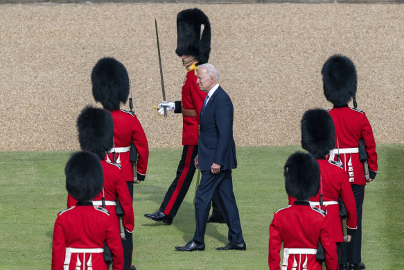 US President Joe Biden inspects the ranks of a Guard of Honour.