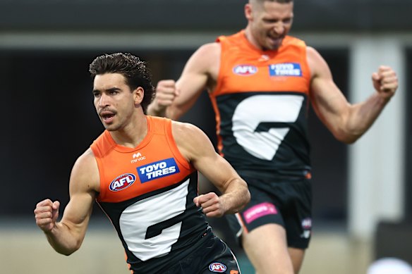 Toby Bedford celebrates one of his two goals against the Hawks.