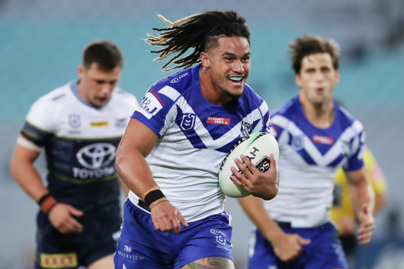 Renouf To'omaga of the Bulldogs runs away to score a try during the round 2 NRL match between Canterbury and North Queensland.