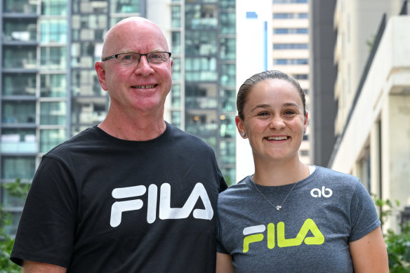 Ash Barty and coach Craig Tyzzer speak to the media in Brisbane on Thursday.