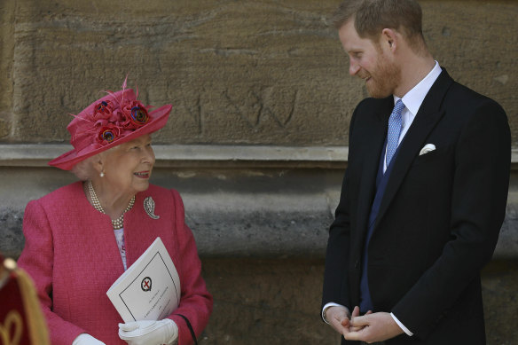 The Queen and Prince Harry share a happy moment after the wedding of Lady Gabriella Windsor and Thomas Kingston at St George’s Chapel, Windsor Castle, in 2019.