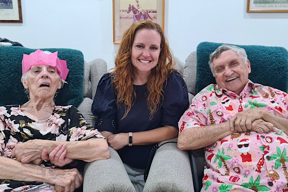 Angie List (center) with parents Helen and Arthur on Christmas Day 2025. 