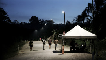 A Paladin security guard has been charged over an alleged assault on Manus Island.