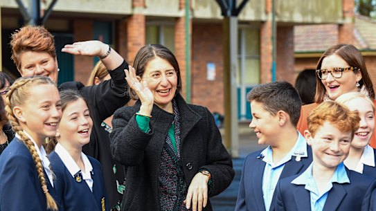 NSW Premier Gladys Berejiklian with students at Panania Public School on Monday.