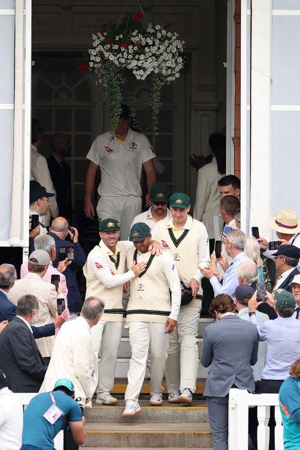 David Warner and Usman Khawaja lead the Australians onto the field after lunch on day five of the Lord’s Test.