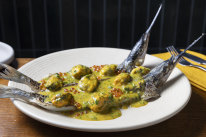 The optional seafood platter (market fish, mussels, salmon caviar and lemon-pickle-spiked butter sauce).