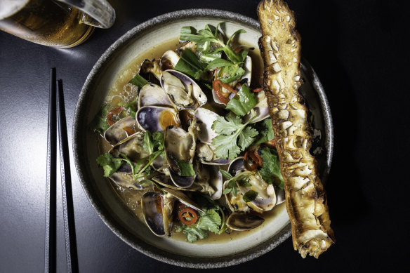 Pipis in canh chua (a sour Vietnamese soup) with wood-fired Chinese doughnut