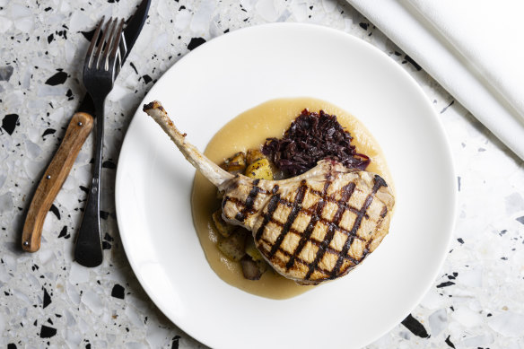 Pork cutlet with red-wine-braised cabbage and apple sauce.