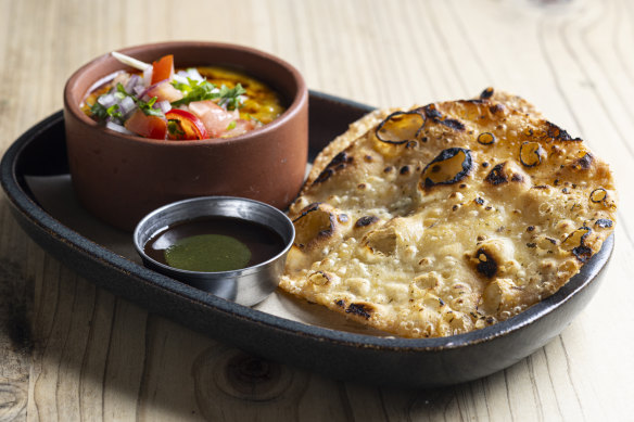 Puri flatbread crisps with chana dhal.