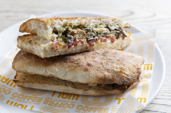 Roast capsicum pide with goat’s cheese, eggplant and pesto.
