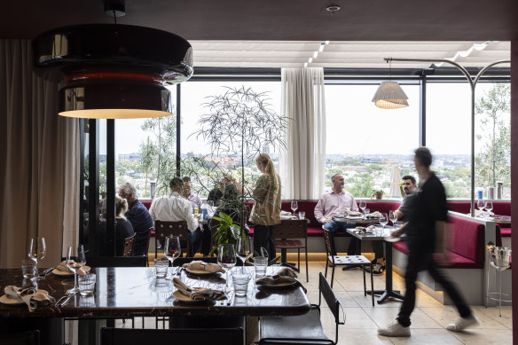 The rooftop restaurant’s glam interior.