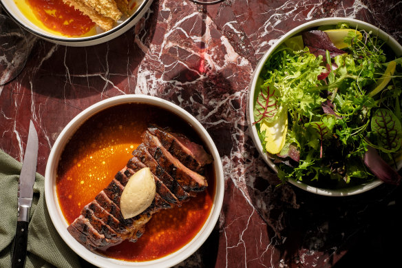 Rangers Valley dry-aged club steak 600g with salad leaves.