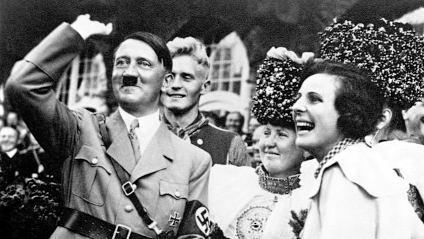 Adolf Hitler with filmmaker Leni Riefenstahl on Nazi party day in Nuremberg, 1934.
