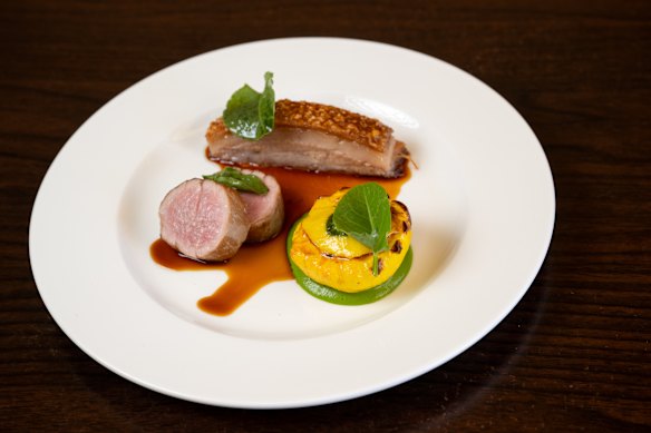 Pork loin and jowl, stuffed squash and cider sauce.