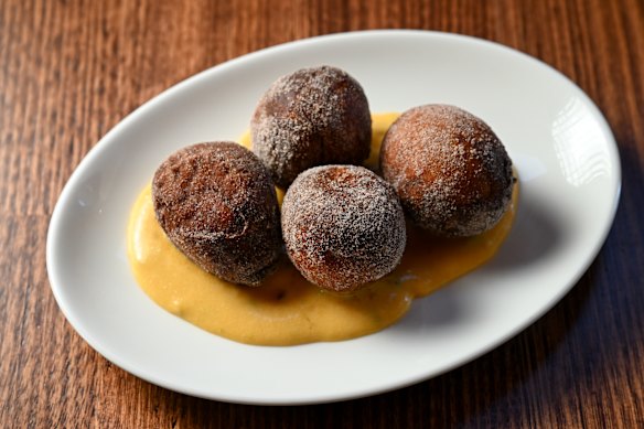 Ricotta doughnuts with chilli sugar and blood orange curd.