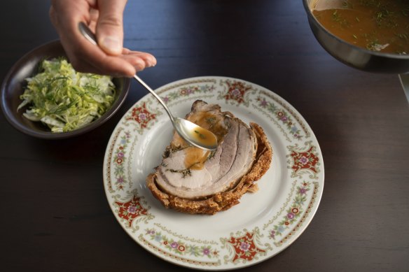 Amber Creek porchetta with jus and a side salad.