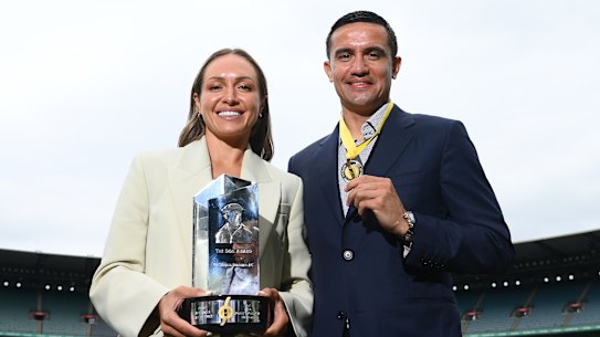 Kyah Simon of the Matildas poses with the Don Award, and Socceroos great Tim Cahill poses with his medal after being inducted into the Sport Australia Hall of Fame at a ceremony at the MCG on Friday.