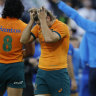 Wallabies players after their one-point defeat to Italy. 