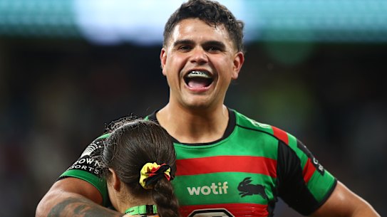 Mitchell embraces South Sydney ball girl Aliyah after a crunch conversion last week.