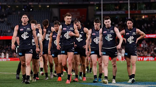 Carlton players leave Marvel Stadium after Sunday’s game.