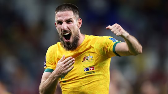 Milos Degenek celebrates Australia’s victory over Denmark to reach the round of 16 at the World Cup.