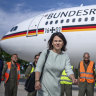 Minister for Foreign Affairs Annalena Baerbock in front of a German government plane.