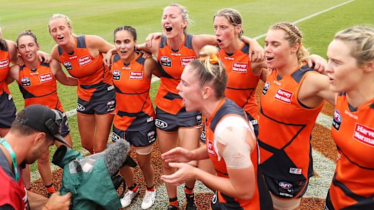 SYDNEY, AUSTRALIA - FEBRUARY 23: Lisa Steane of the Giants leads the team song as the Giants celebrate victory during the round three AFLW match between the Greater Western Sydney Giants and the West Coast Eagles at Blacktown International Sportspark on February 23, 2020 in Sydney, Australia. (Photo by Mark Kolbe/Getty Images)