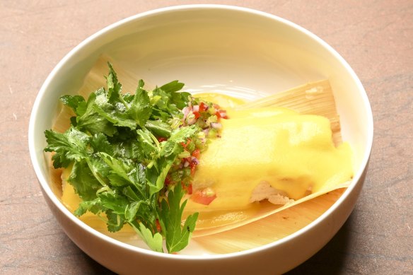 Corn tamale is a corn triple play, the ground nixtamalised corn dough steamed in corn husks blanketed by corn sauce.