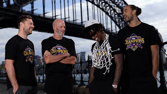 Matthew Dellavedova, Brian Goorjian, Kendric Davis and Xavier Cooks after the Sydney Kings won the NBL title.