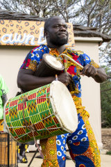Dance to African rhythms at the Saturday Village Market.