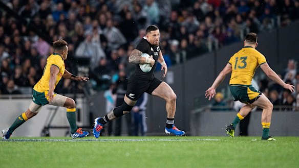 Sonny Bill Williams makes a typically strong run against the Wallabies.  