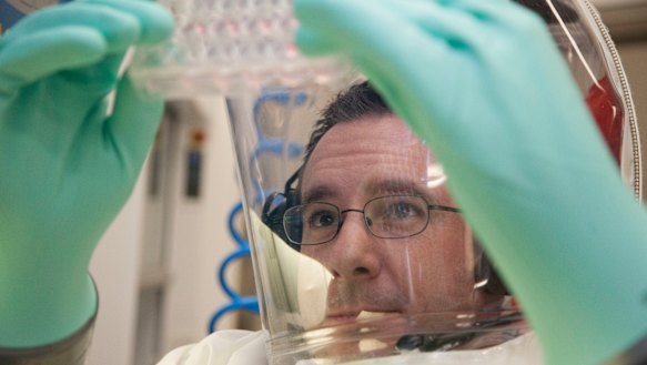 Scientists working in the secure area at CSIRO's Australian Animal Health Laboratory.