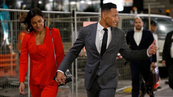 Israel Folau gives supporters the thumbs-up during his battle with Rugby Australia.