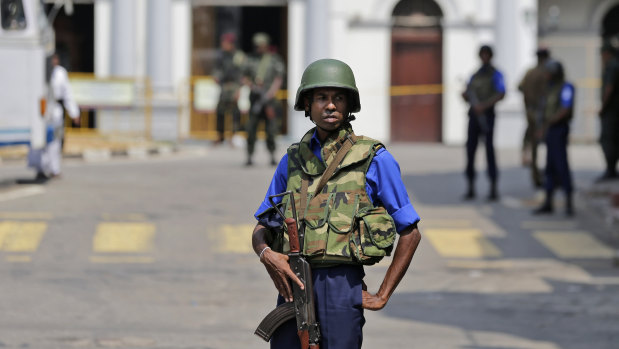 Sri Lankan navy soldiers keep guard outside St Anthony's Church in Colombo on Thursday as authorities warn of further 'imminent' attacks.