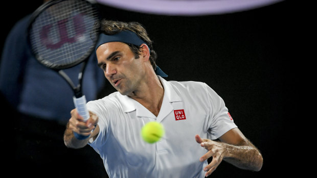Swiss champ Roger Federer on his way to a straight-sets win over American Taylor Fritz.